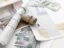 Carpet, hardwood, laminate, vinyl, and tile flooring samples compared by cost per square foot